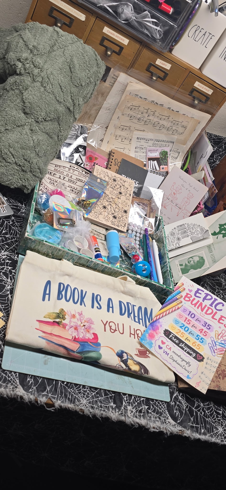 Bundle with sheet music, vintage papers, and a book tote